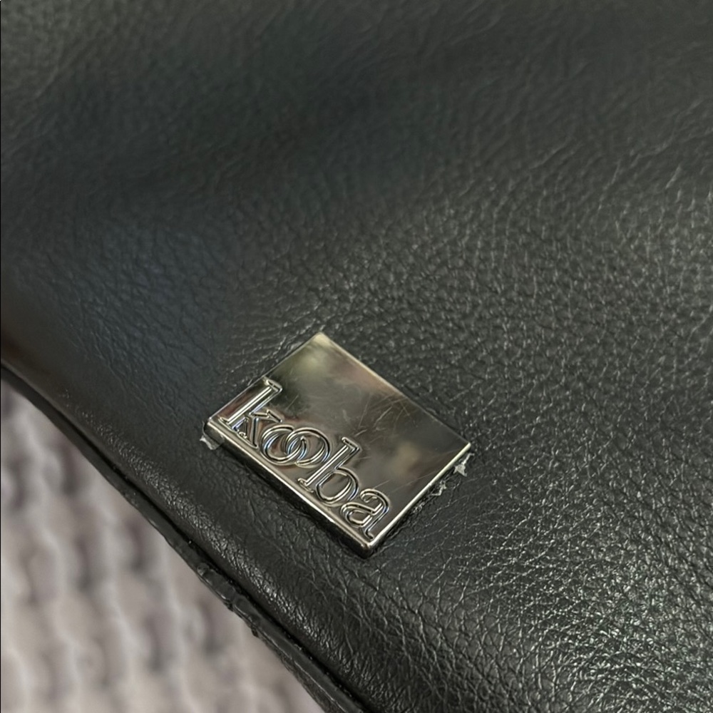 Kooba Elegant Black Leather Handbag with the long strap and magnetic closure - Picture 4 of 15